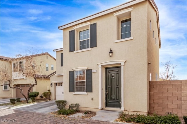 view of front of home with a garage