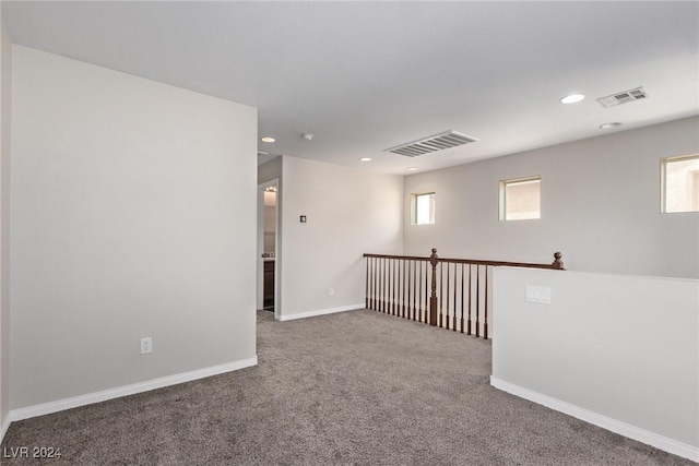 empty room with carpet floors