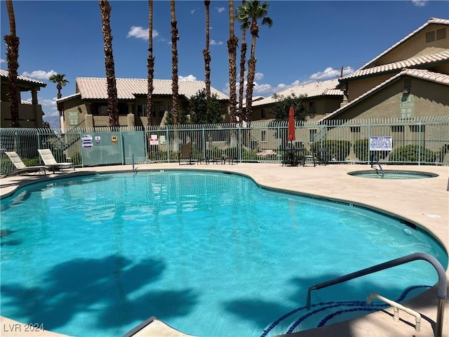 338 Jett St Unit 101, Las Vegas, NV 89145 - community pool with a patio