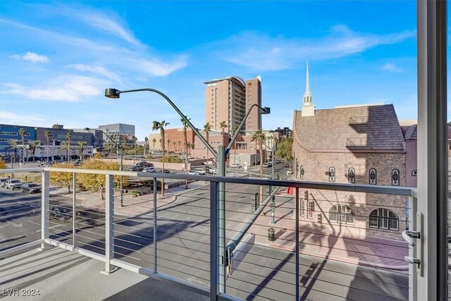 balcony featuring a view of city