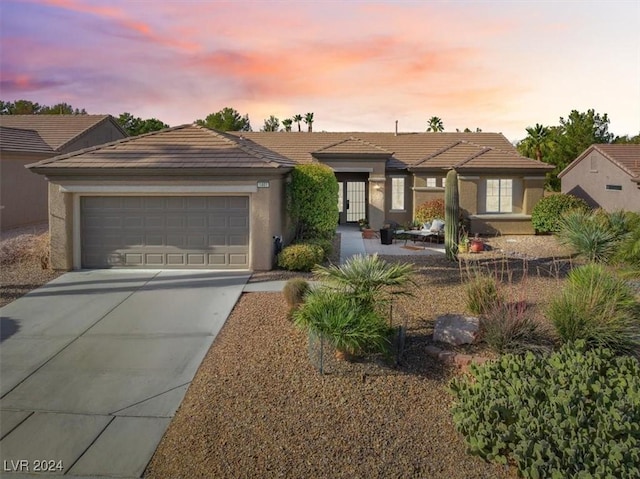 view of front of house with a garage