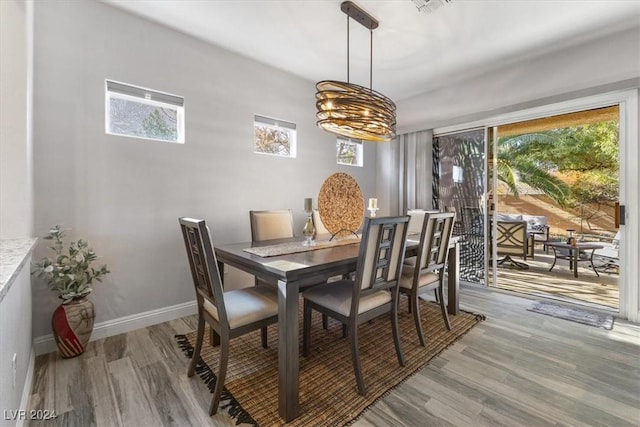 dining area featuring wood-type flooring