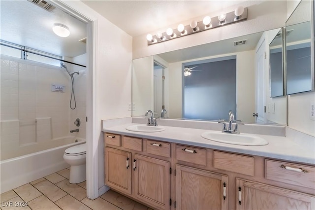 full bathroom featuring vanity, shower / tub combination, tile patterned floors, ceiling fan, and toilet