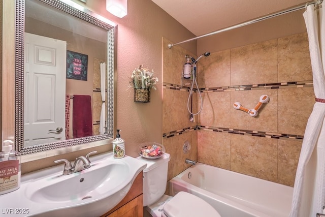 full bathroom featuring shower / tub combo with curtain, vanity, and toilet