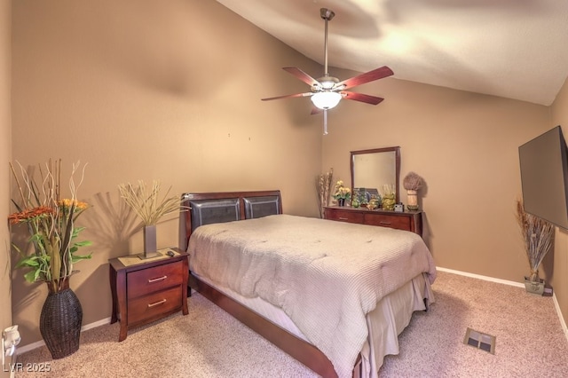 carpeted bedroom with lofted ceiling and ceiling fan