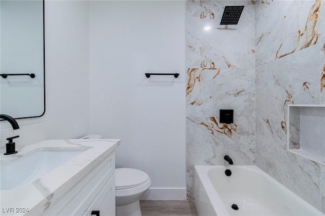 full bathroom with bathtub / shower combination, wood-type flooring, vanity, and toilet