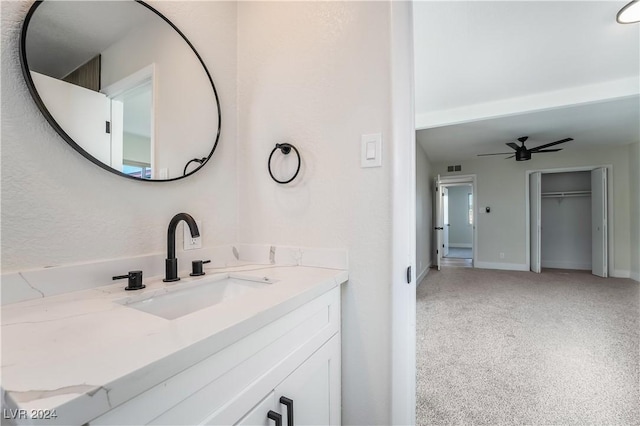 bathroom with vanity and ceiling fan