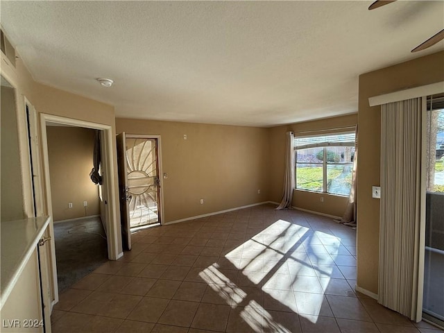 view of tiled spare room