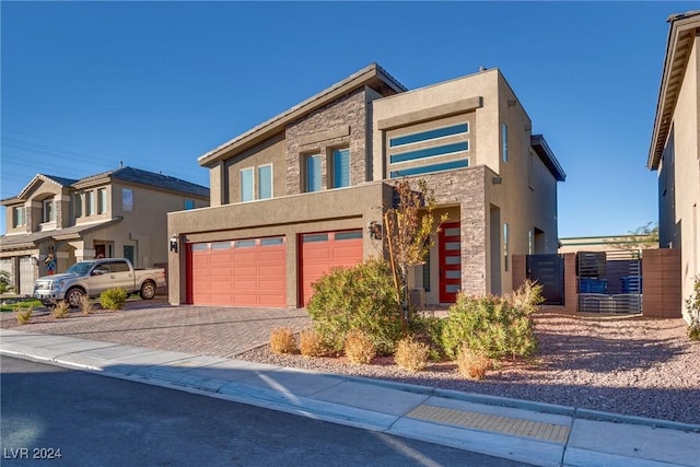 view of front of property with a garage