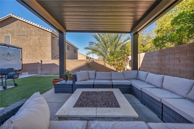 view of patio / terrace featuring an outdoor living space with a fire pit