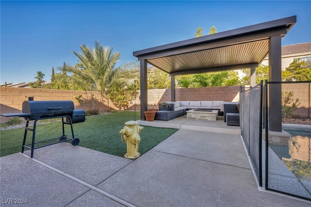 view of patio / terrace with area for grilling and outdoor lounge area