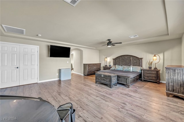 bedroom featuring ceiling fan and light hardwood / wood-style floors