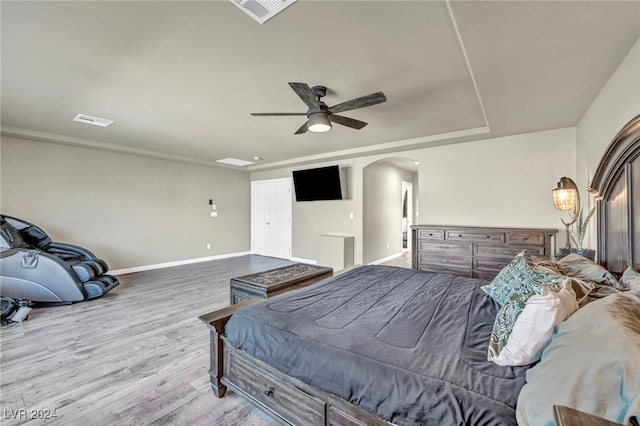 bedroom featuring ceiling fan and light hardwood / wood-style floors