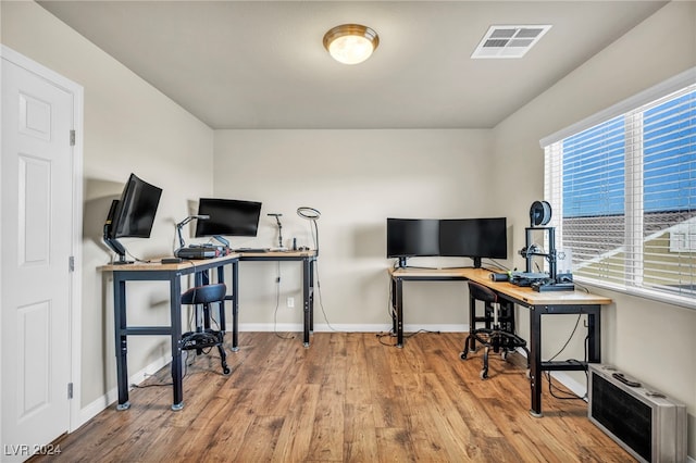 office area with hardwood / wood-style flooring