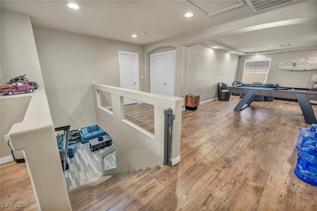 recreation room featuring light hardwood / wood-style flooring