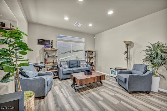 living room with light hardwood / wood-style flooring