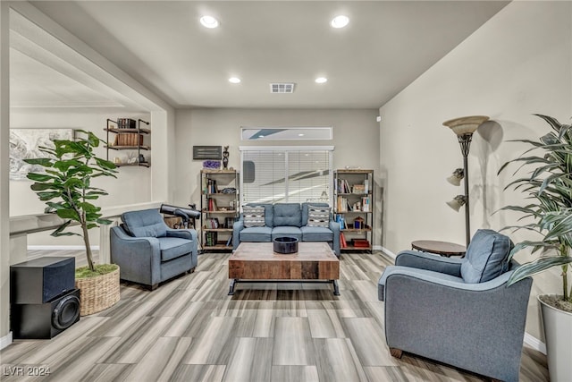 living room with light hardwood / wood-style floors