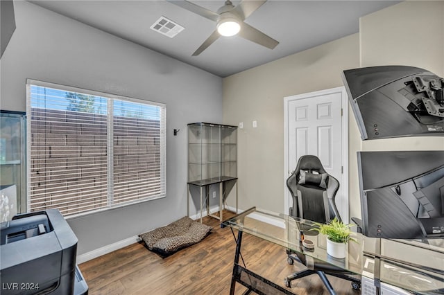 office area with ceiling fan and dark hardwood / wood-style flooring