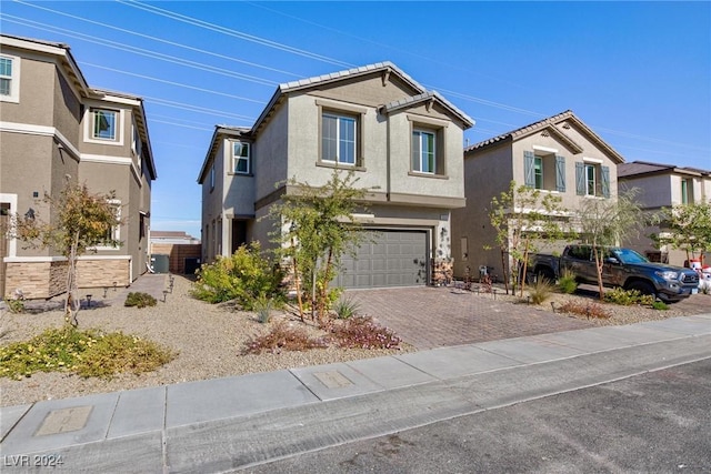 view of front of property featuring a garage