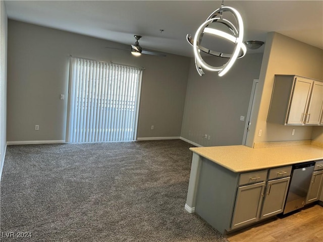 kitchen with gray cabinetry, dishwasher, light carpet, ceiling fan, and kitchen peninsula