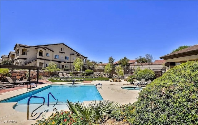 view of pool with a patio area