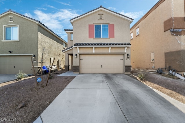 view of front of house with a garage