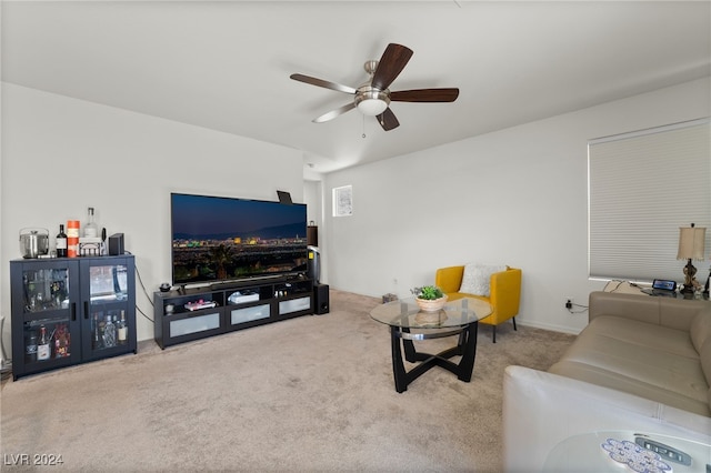 living room with carpet floors and ceiling fan