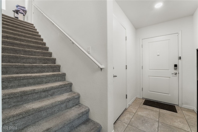 foyer with light tile patterned floors