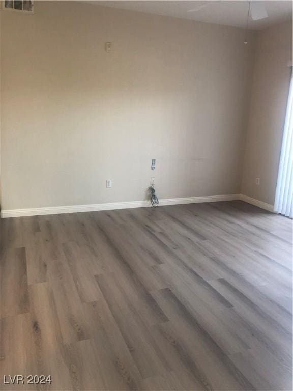 unfurnished room featuring wood-type flooring