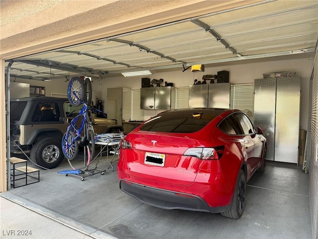 garage featuring a garage door opener