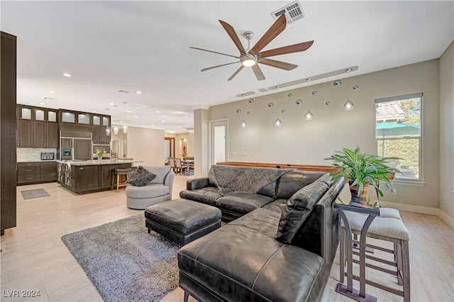 living room featuring ceiling fan