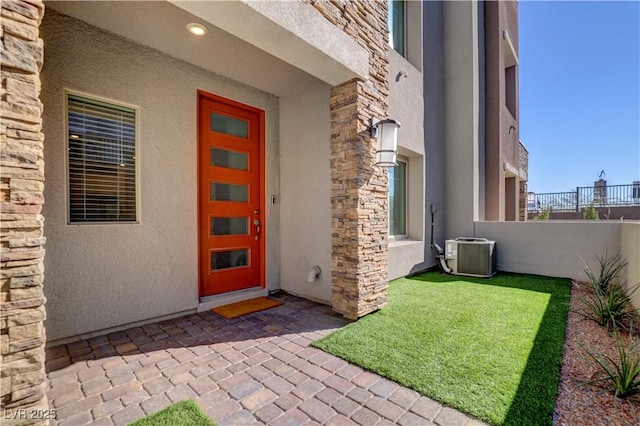 property entrance with central air condition unit