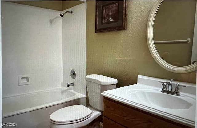 full bathroom featuring shower / washtub combination, vanity, and toilet