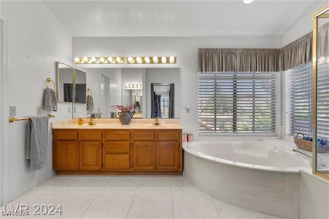 bathroom featuring a bathtub and vanity