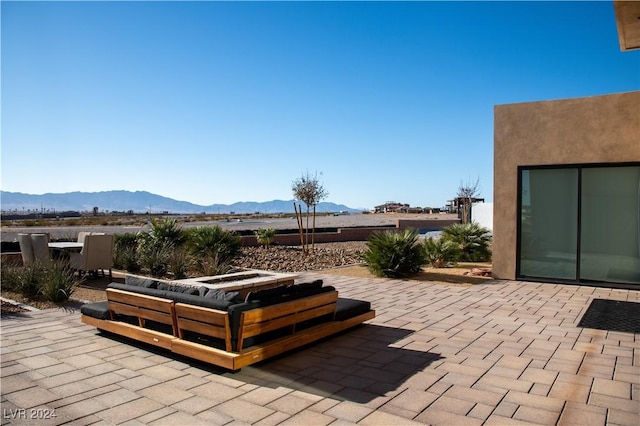 view of patio featuring a mountain view