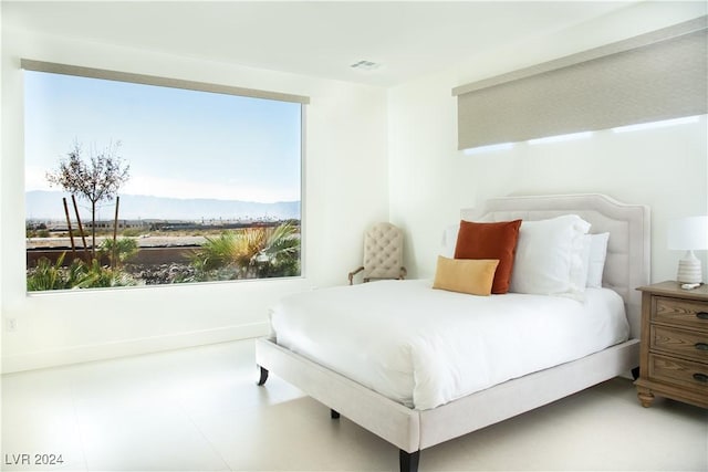 bedroom with a mountain view