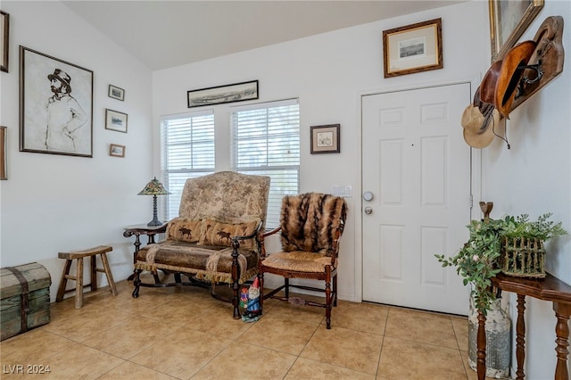 living area featuring light tile patterned flooring