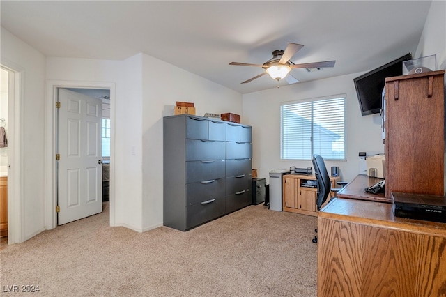 office area with ceiling fan and light colored carpet