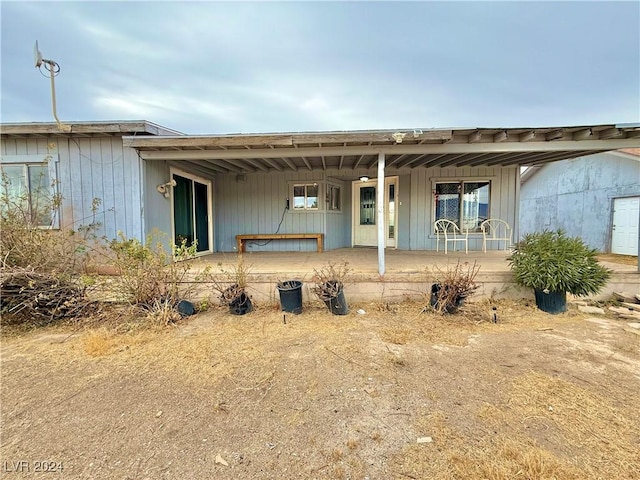 exterior space featuring covered porch