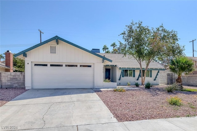 single story home with a garage