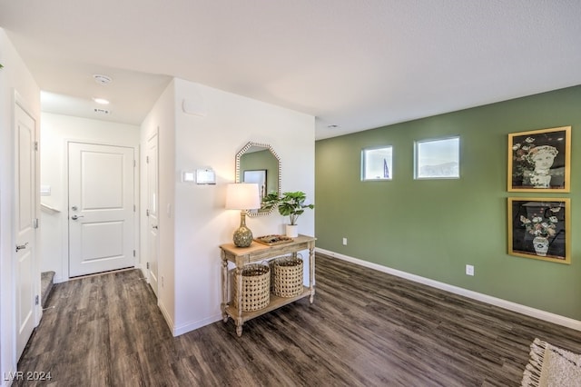 hallway featuring dark hardwood / wood-style floors