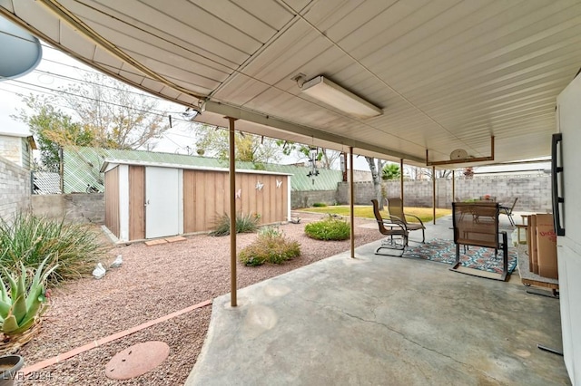 view of patio / terrace featuring a shed