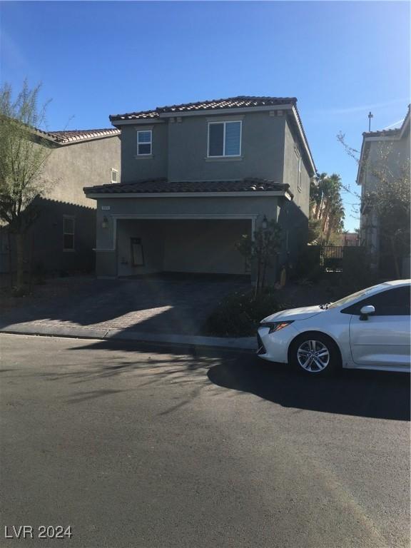 front facade with a garage