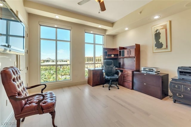 office space with ceiling fan and light wood-type flooring