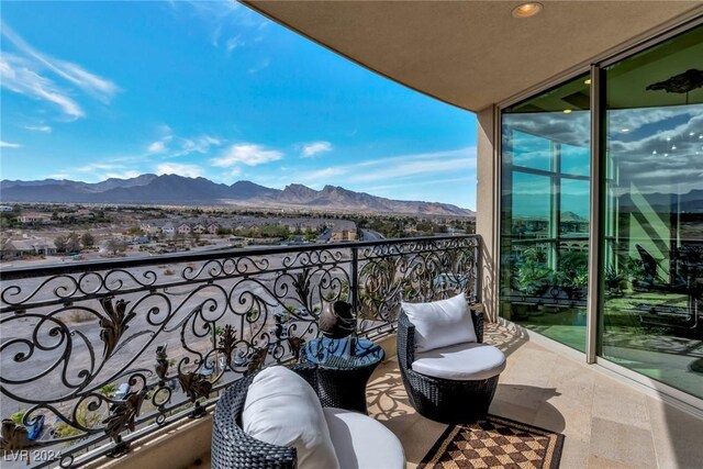 balcony featuring a mountain view