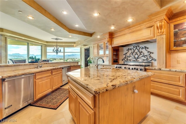 kitchen with backsplash, a large island, sink, and appliances with stainless steel finishes