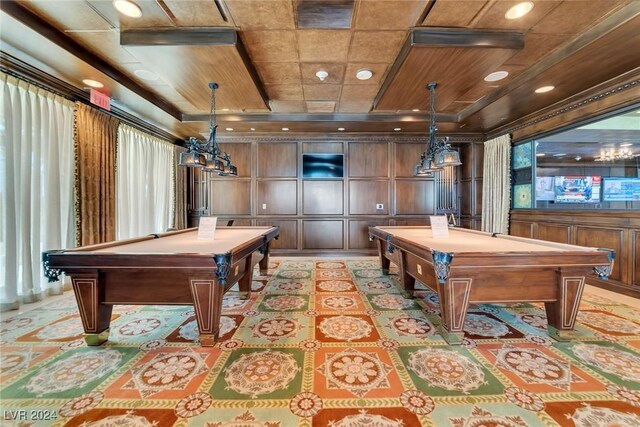 game room with wooden walls, plenty of natural light, and pool table