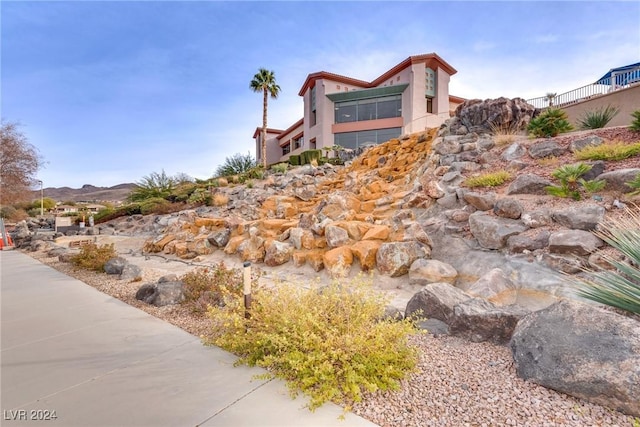 exterior space with a mountain view