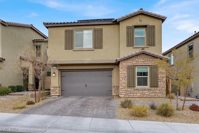 view of front of house with a garage