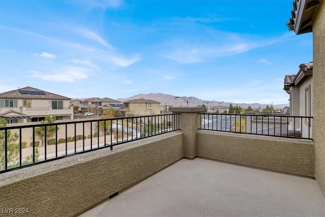 balcony featuring a mountain view